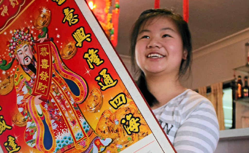 Alice Wu, whose parents own Roses Chinese Restaurant, celebrates the new Chinese year. Alice Wu, whose parents own Roses Chinese Restaurant, celebrates the new Chinese year.